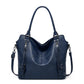 Faux leather shopper, stylish women's shoulder bag with a zipper, trendy wallet set